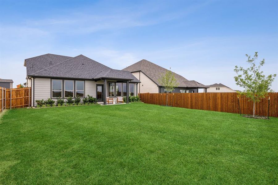 Backyard in the Stanley II home plan by Trophy Signature Homes – REPRESENTATIVE PHOTO