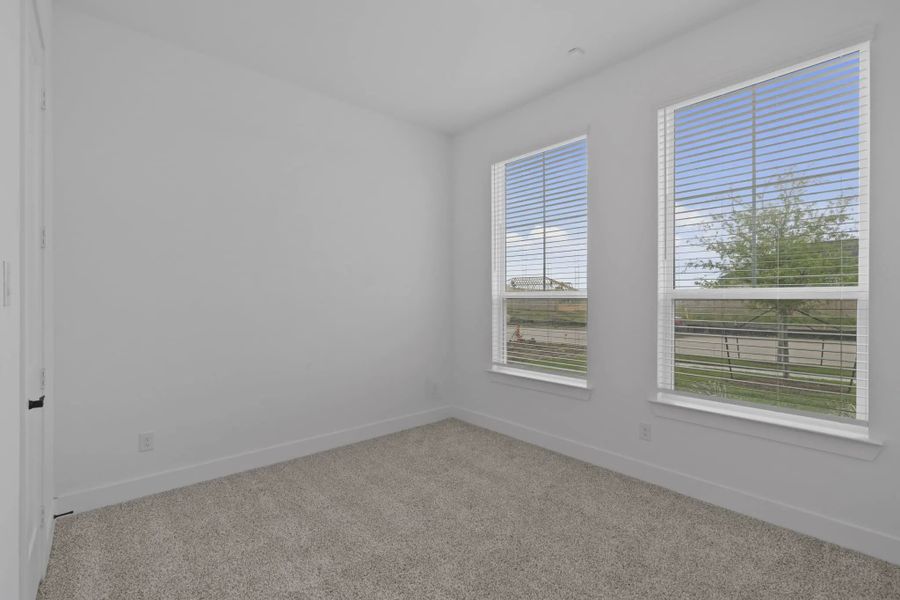 Representative unfurnished interior of a home built from the Lauren by Chesmar Homes in Beacon Point, Texas City (Image 25). Representative unfurnished interior of a home built from the Lauren by Chesmar Homes in Beacon Point, Texas City (Image 25).
