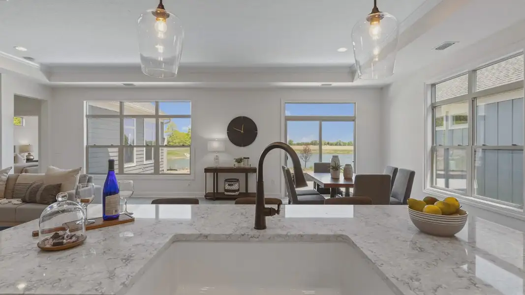 Representative furnished interior of a home built from the Salerno by Epcon Communities in Courtyards by Carrell, Ocean Isle Beach (Image 10).