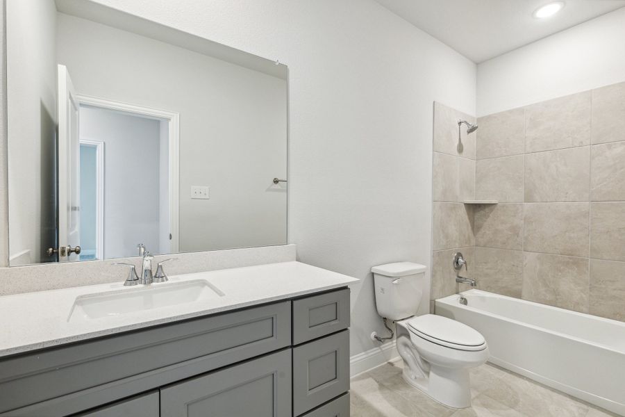 Representative furnished interior of a home built from the Lyla by Megatel Homes in Santorini, Seagoville (Image 7).