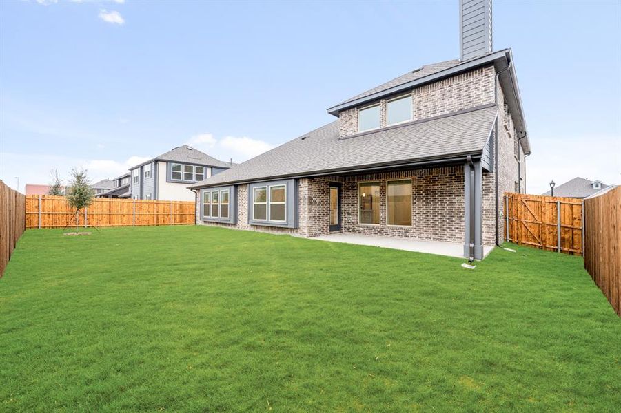 Exterior details and patio area of a home in West Crossing, Anna (Image 28). Exterior details and patio area of a home in West Crossing, Anna (Image 28).