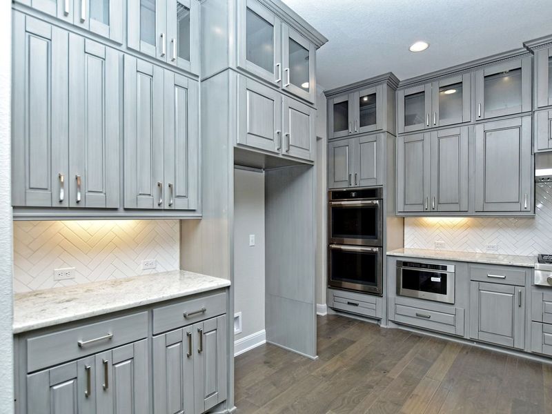 Representative furnished interior of a home built from the Madera II by Giddens Homes in Scofield Farms Estates, Georgetown (Image 173).