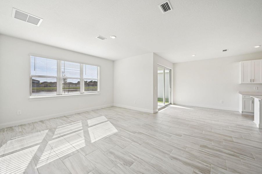Furnished interior view inside a new home in Brystol at Wylder - Reserve Series, Port St. Lucie (Image 7).