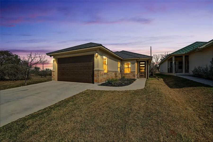 Front exterior of a new home in , Horseshoe Bay, TX, highlighting curb appeal (Image 2).