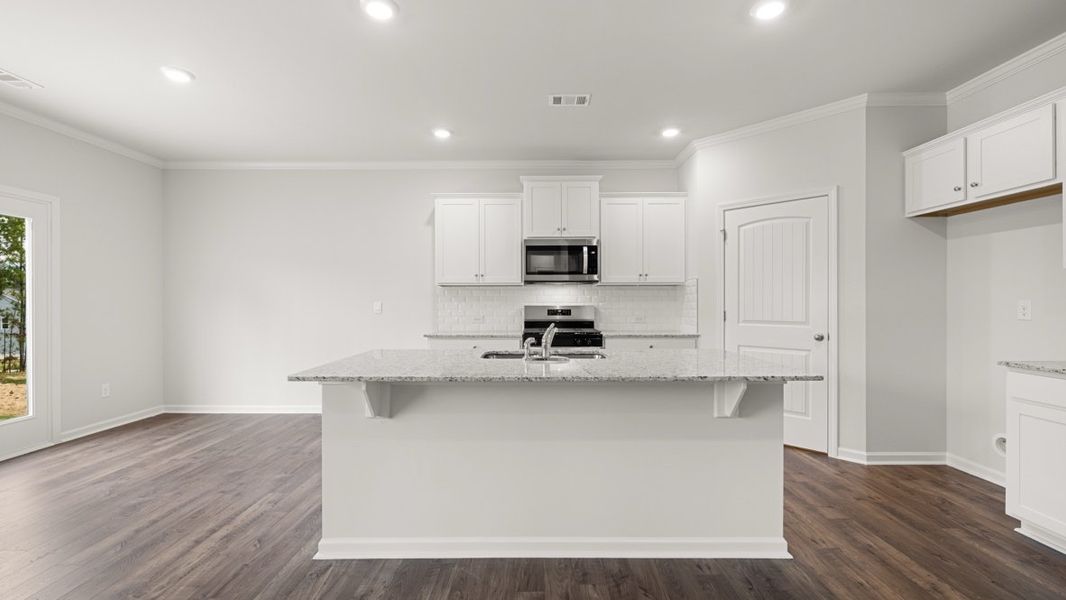 Representative furnished interior of a home built from the Hayden by D.R. Horton in Liberty Crossing, Braselton (Image 6).