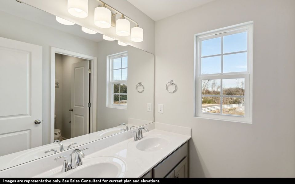 Representative furnished interior of a home built from the Magellan by CastleRock Communities in McCain's Station, Gallatin (Image 9).