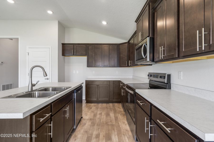 Furnished interior view inside a new home in Summerglen, Jacksonville (Image 8). Furnished interior view inside a new home in Summerglen, Jacksonville (Image 8).