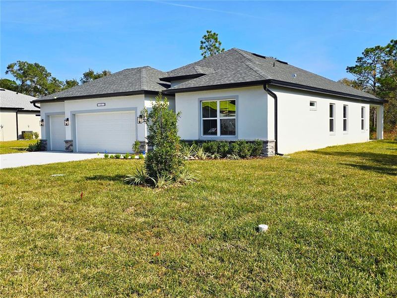 Front exterior of a new home in , Homosassa, FL, highlighting curb appeal (Image 28).