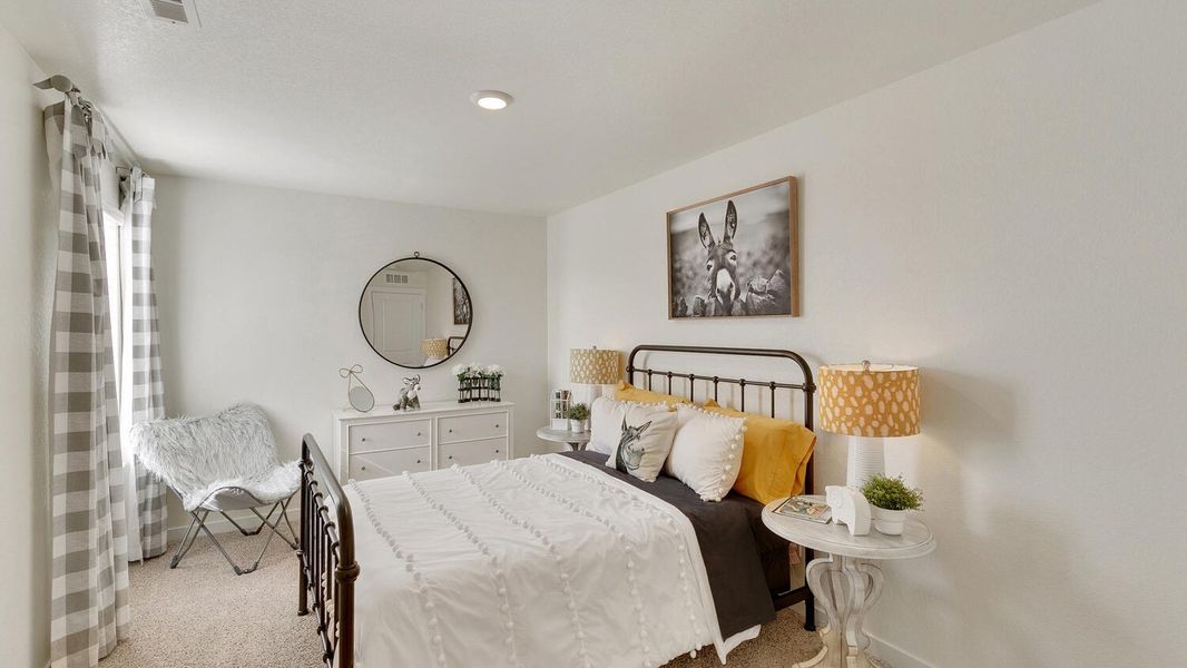 Representative furnished interior of a home built from the Holcombe by D.R. Horton in Settlers Crossing, Commerce City (Image 19).