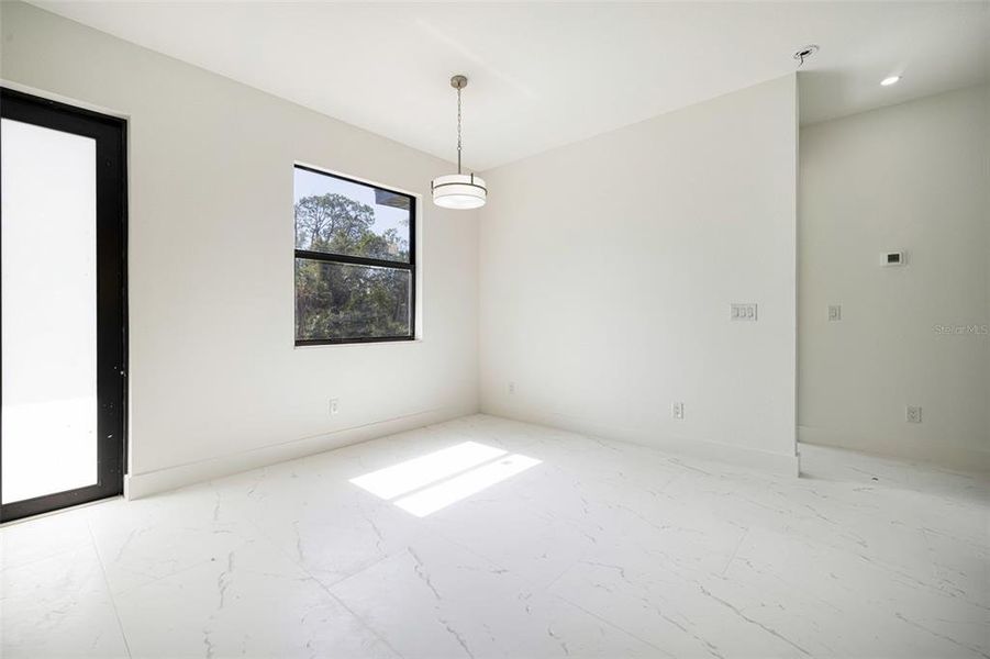 Spacious, unfurnished interior of a new home in , Port Charlotte (Image 20).