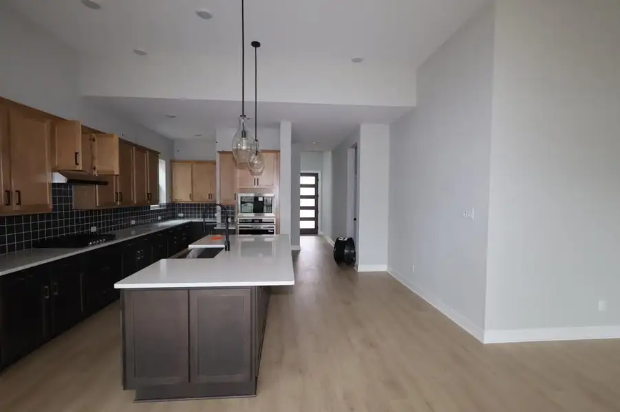 Furnished interior view inside a new home in , Manvel (Image 3).