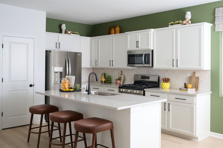 Representative furnished interior of a home built from the The Pintail Int by David Weekley Homes in Nexus Townhomes, Gallatin (Image 5).