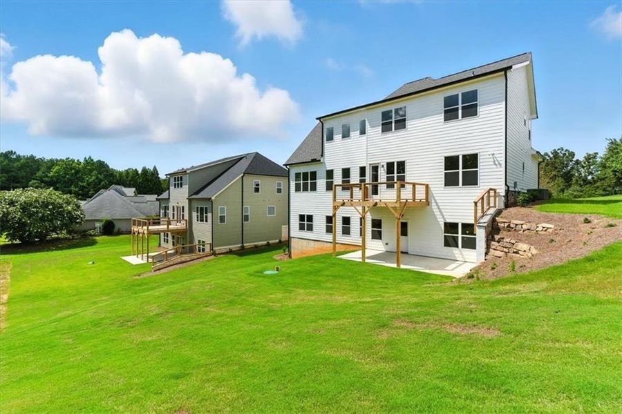 Front exterior of a new home in , Rome, GA, highlighting curb appeal (Image 26).