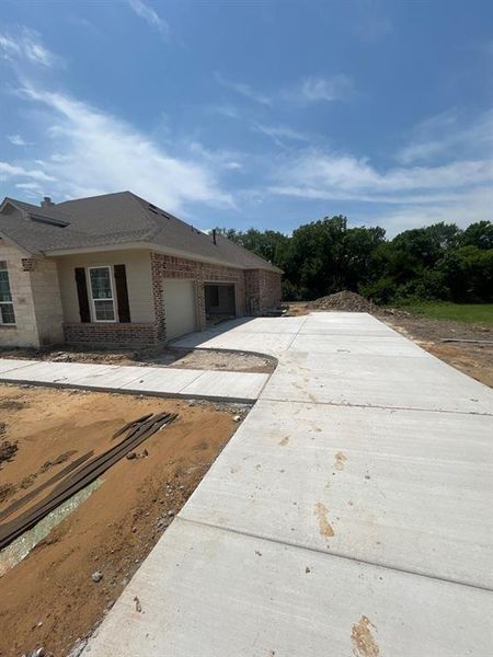 In-progress construction of a new home in Grayson Ridge, Van Alstyne, TX (Image 5).
