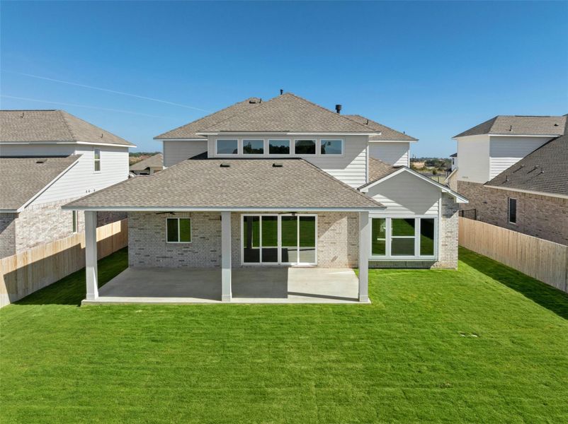Exterior details and patio area of a home in Santa Rita Ranch, Liberty Hill (Image 23).