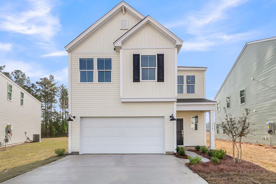 Front exterior of a new home in Wildcat Chase, Summerville, SC, highlighting curb appeal (Image 17).