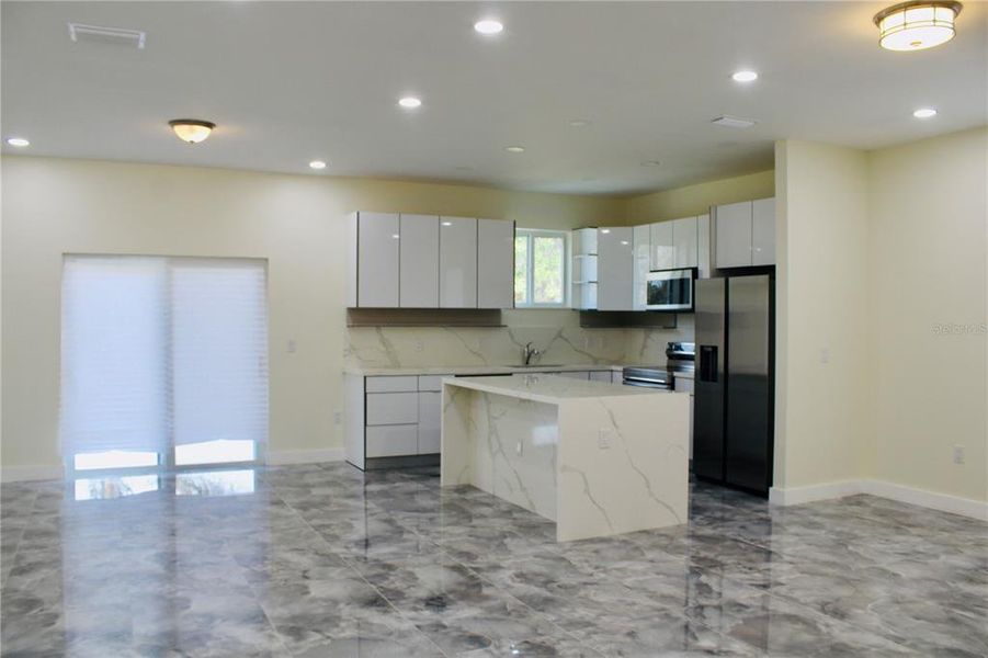 Furnished interior view inside a new home in , Port Charlotte (Image 9).