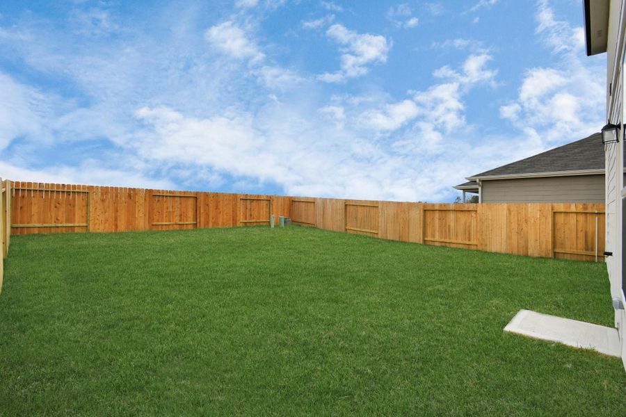 Exterior details and patio area of a home in Decker Farms, Magnolia (Image 19).