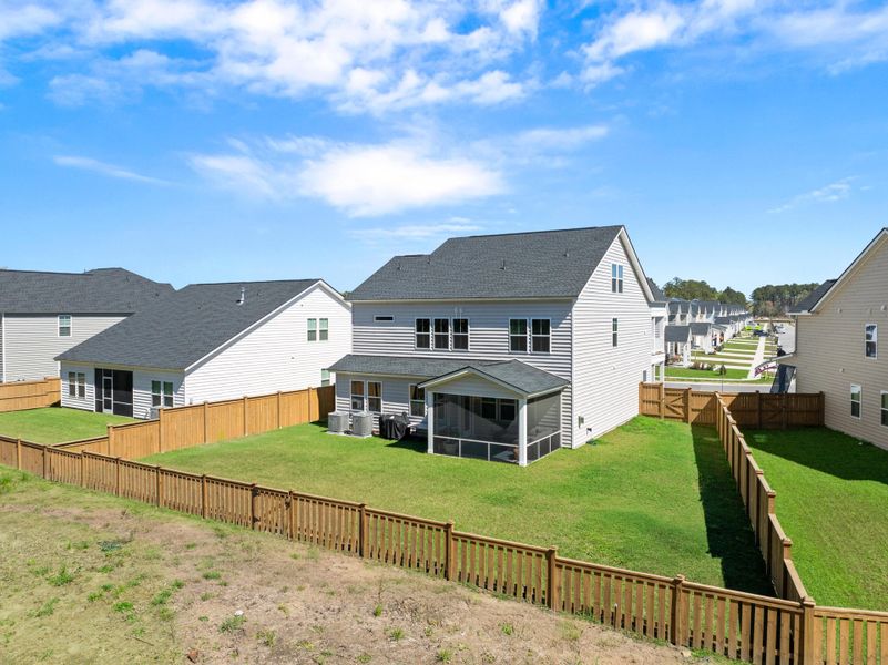 Exterior details and patio area of a home in Sweetgrass at Summers Corner, Summerville (Image 21).