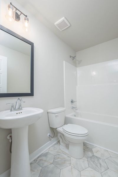 Representative furnished interior of a home built from the Juniper by Nason Homes in Cole Properties Subdivision, Dickson (Image 9).