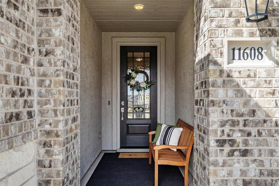 Exterior details and patio area of a home in Robson Ranch Texas, Denton (Image 3).