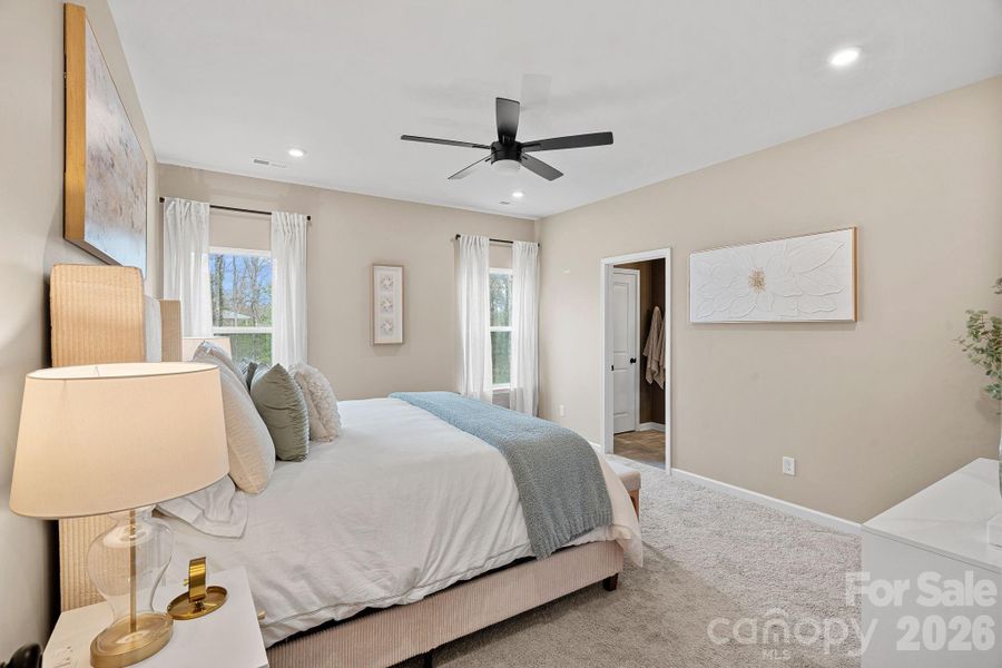 Another view of the primary suite. Another view of the primary suite.