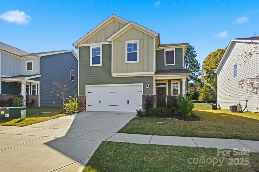 Front exterior of a new home in , Monroe, NC, highlighting curb appeal (Image 2). Front exterior of a new home in , Monroe, NC, highlighting curb appeal (Image 2).
