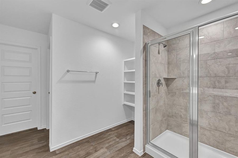 Huge Massive Walk In Shower that can hold two! Separate Deep Soaker Tub! with Gorgeous Vinyl Floors Surroundings and Seamless Glass Shower Door! Never run out of Hot Water taking that Long, Relaxing Hot Shower with the Tankless/On-Demand H2O Heater! **Image Representative of Plan Only and May Vary as Built**