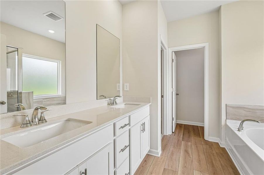 Furnished interior view inside a new home in Northwoods at Mirror Lake, Villa Rica (Image 34).