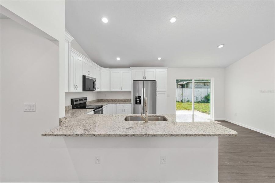 Furnished interior view inside a new home in , Dunnellon (Image 9).