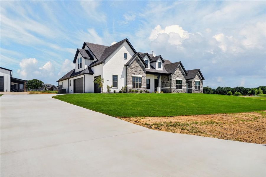 Representative exterior photo of a completed home built from the The Braden II by Doug Parr Custom Homes in Kessler Farms, Weatherford, TX (Image 34).