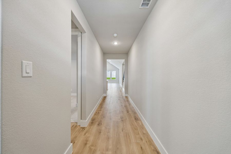 Spacious, unfurnished interior of a new home in Painted Tree Woodland West, McKinney (Image 30).