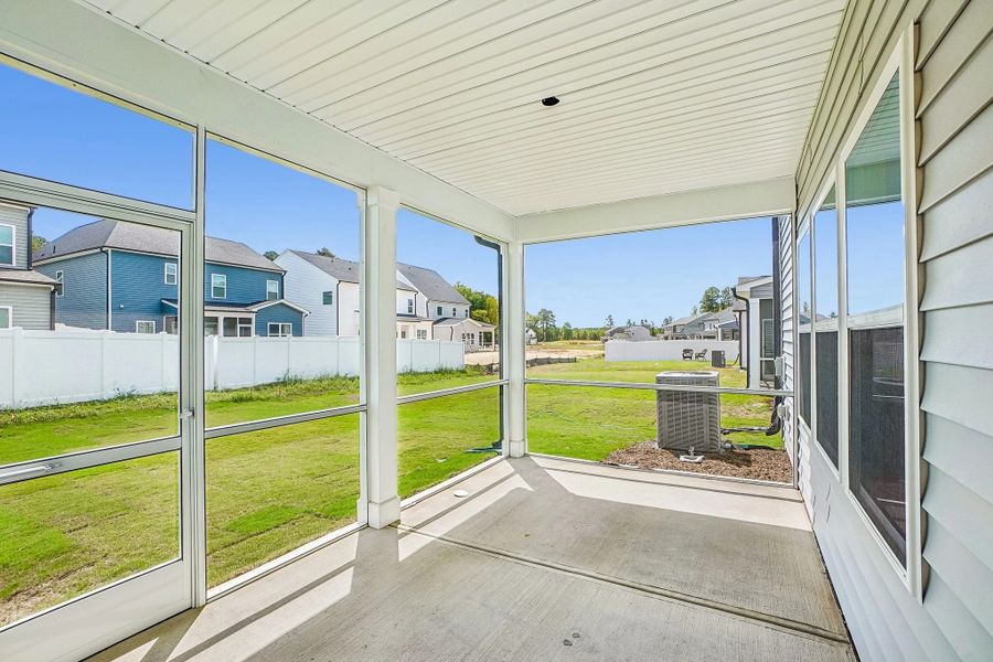 Screened-In Porch featuring the AW Collection® Timeless - A lovely spot to sip and unwind.