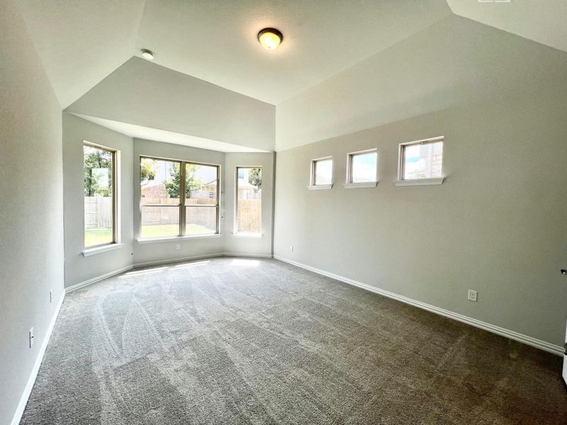 Unfurnished room featuring carpet floors and baseboards Unfurnished room featuring carpet floors and baseboards