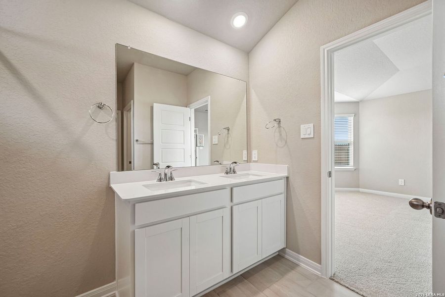 Furnished interior view inside a new home in Legendary Trails - Premier Series, Cibolo (Image 15). Furnished interior view inside a new home in Legendary Trails - Premier Series, Cibolo (Image 15).