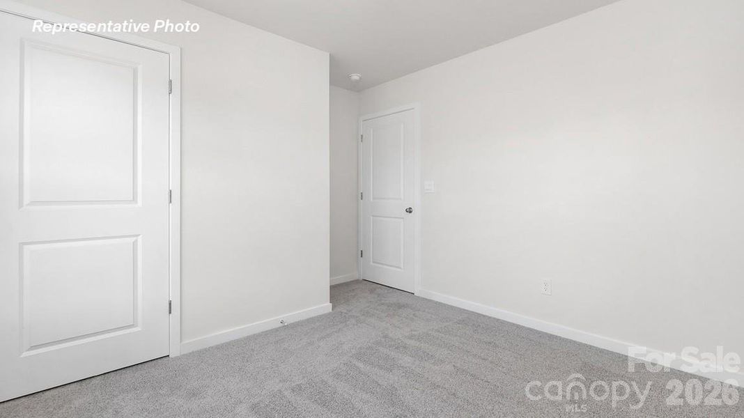 Spacious, unfurnished interior of a new home in Reedy Creek Preserve, Charlotte (Image 14).