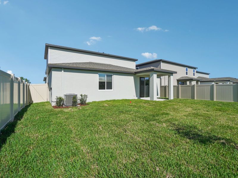 Exterior details and patio area of a home in Two Rivers - Classic Series, Zephyrhills (Image 4).