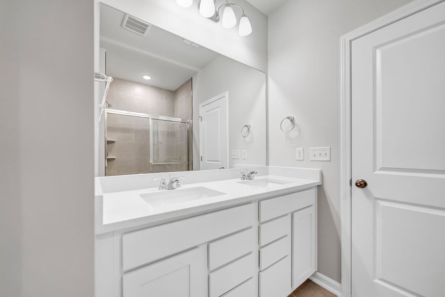 Furnished interior view inside a new home in Monroe Preserve, Chapin (Image 14).
