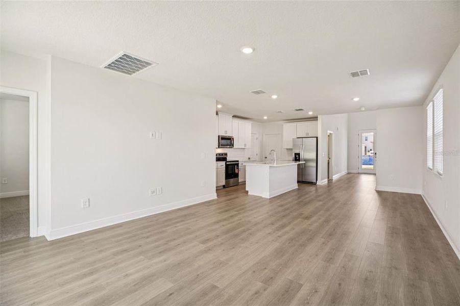 Spacious, unfurnished interior of a new home in The Reserve at Hammock Oaks - Classic Series, Lady Lake (Image 18).