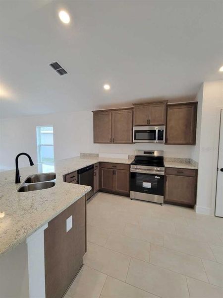 Furnished interior view inside a new home in Ocala Crossings South, Ocala (Image 8).