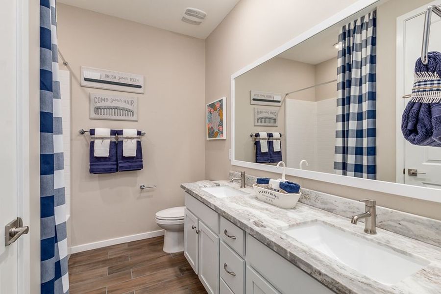 Representative furnished interior of a home built from the Diamond by Elliott Homes in Forté at Granite Vista, Waddell (Image 17). Representative furnished interior of a home built from the Diamond by Elliott Homes in Forté at Granite Vista, Waddell (Image 17).