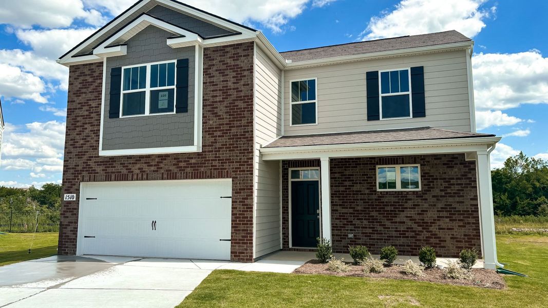 Representative exterior photo of a completed home built from the BELFORT by D.R. Horton in The Parks, White House, TN (Image 20).
