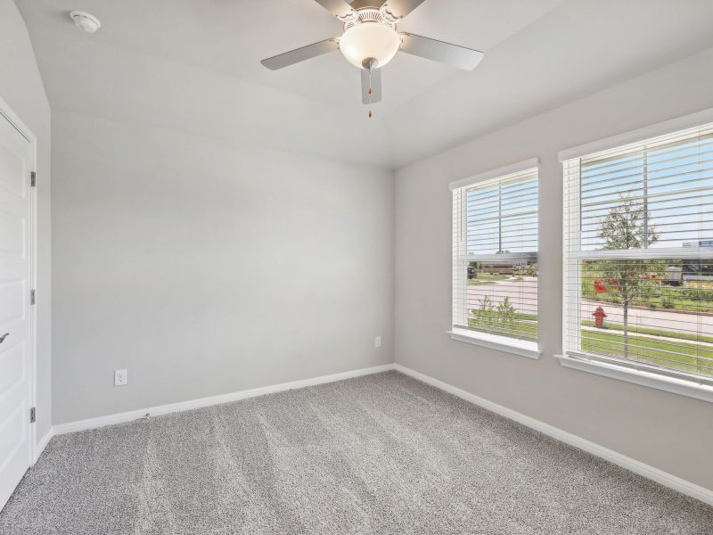 Two of the secondary bedrooms are next to each other with a bathroom in between.