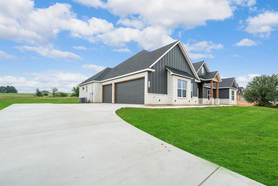 Front exterior of a new home in , Weatherford, TX, highlighting curb appeal (Image 2). Front exterior of a new home in , Weatherford, TX, highlighting curb appeal (Image 2).