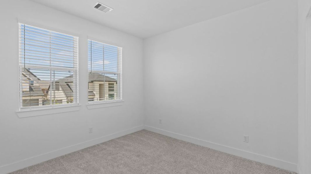 Spacious, unfurnished interior of a new home in Attwater 55s, Waller (Image 27).