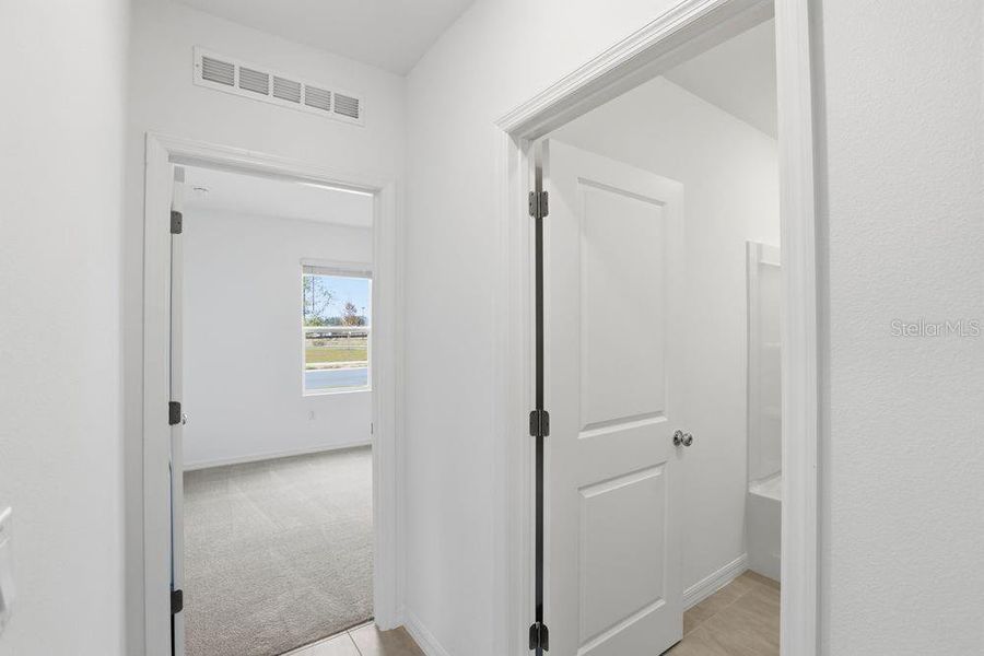 Spacious, unfurnished interior of a new home in Waterstone, Groveland (Image 39).