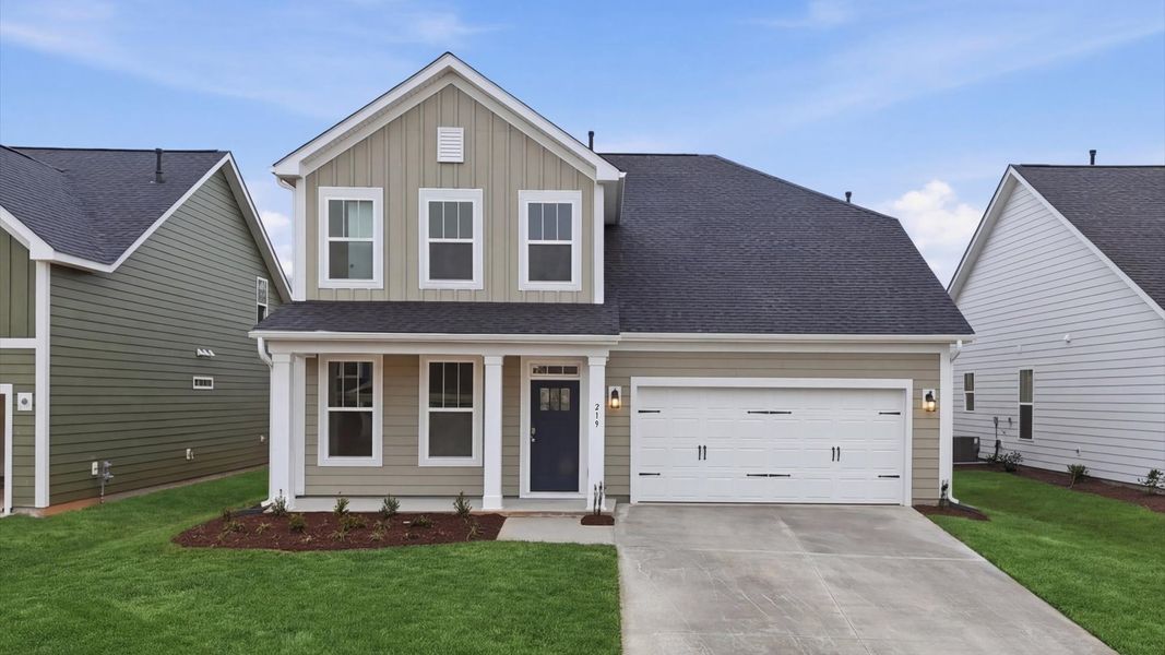 Front exterior of a new home in Mulberry Estates, Simpsonville, SC, highlighting curb appeal (Image 2). Front exterior of a new home in Mulberry Estates, Simpsonville, SC, highlighting curb appeal (Image 2).