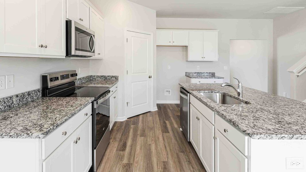 Furnished interior view inside a new home in Cedar Hill Landing, Navassa (Image 10). Furnished interior view inside a new home in Cedar Hill Landing, Navassa (Image 10).