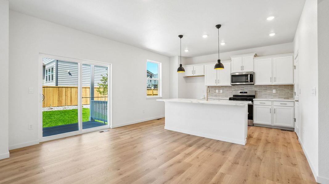 Furnished interior view inside a new home in Trails at Crowfoot, Parker (Image 7).