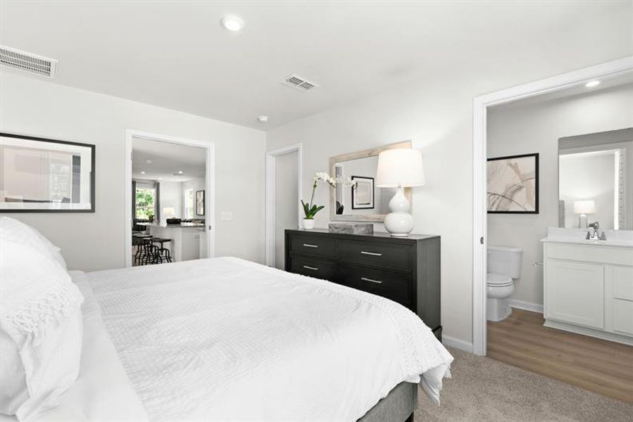 Representative furnished interior of a home built from the Reese by Ryan Homes in Middle Creek Village Coastal Cottages & Villas, Bolivia (Image 19).